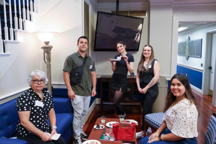 Students and guests smiling.